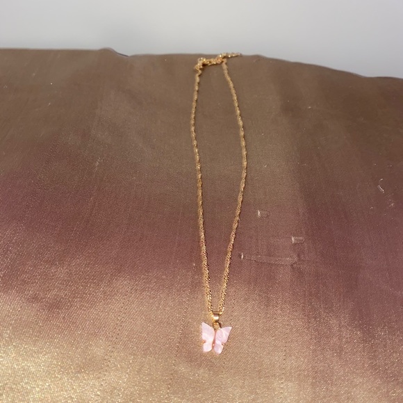 Urban Outfitters Jewelry - Light pink butterfly necklace